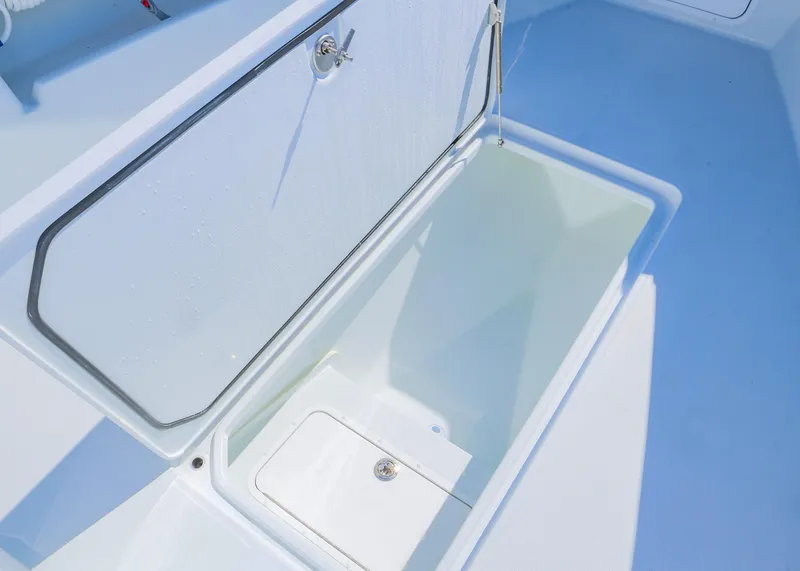 Slide: The Image of Open storage compartment on 2025 Invincible 39 Open Fisherman boat. - 26