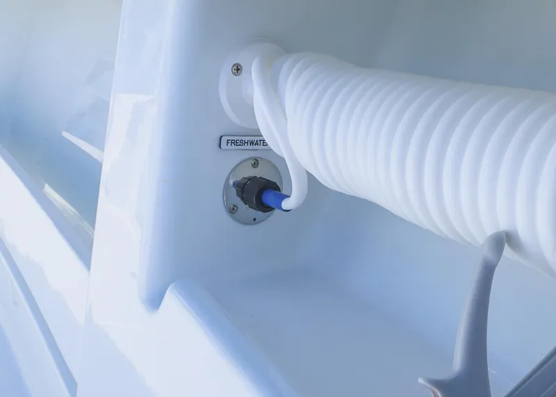 Slide: The Image of Freshwater hose connection on 2025 Invincible 39 Open Fisherman boat. - 28