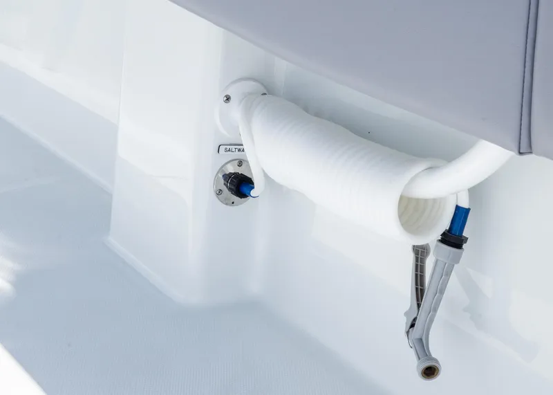 Slide: The Image of 2025 Invincible 39 Open Fisherman boat hose and saltwater outlet detail. - 30
