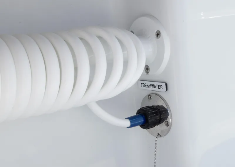 Slide: The Image of Freshwater hose connection on 2025 Invincible 39 Open Fisherman boat. - 31