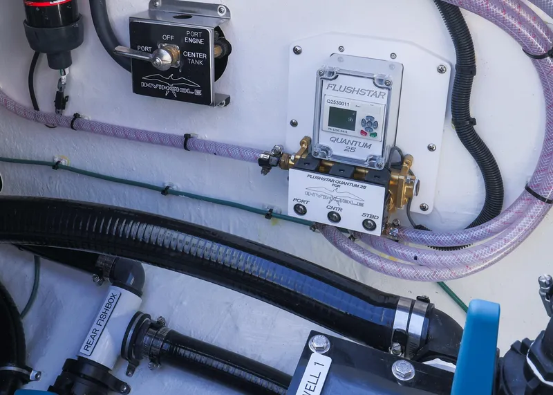 Slide: The Image of 2025 Invincible 39 Open Fisherman engine compartment with Flushstar Quantum system and labeled components. - 33
