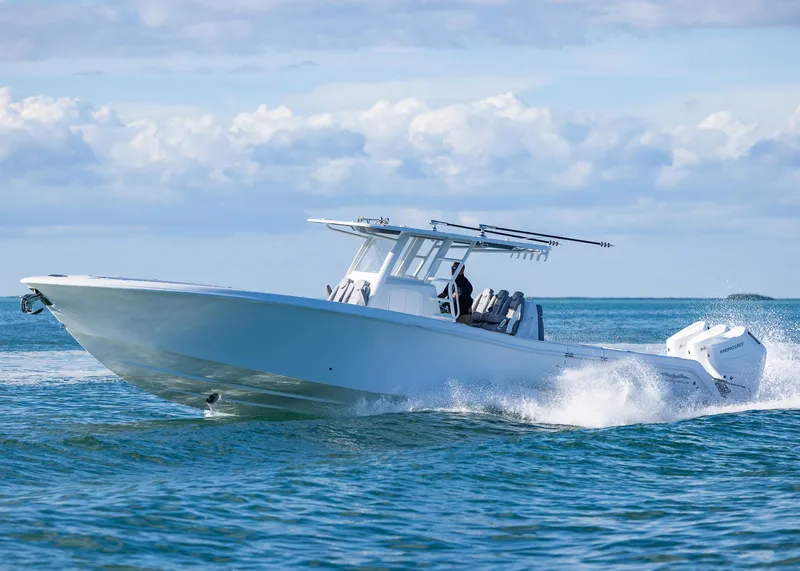 Slide: The Image of 2025 Invincible 39 Open Fisherman boat cruising on open water. - 39