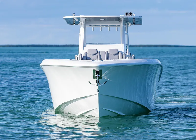 Slide: The Image of 2025 Invincible 39 Open Fisherman boat on calm blue water. - 5