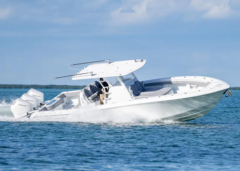 Slide: The Image of 2025 Invincible 39 Open Fisherman boat cruising on open water. - 8