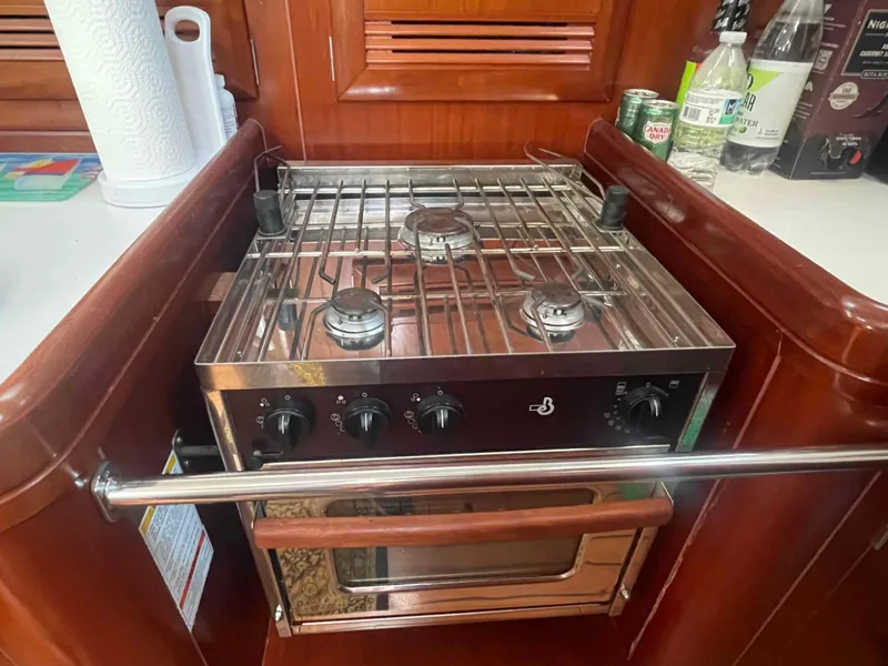 Slide: The Image of Stainless steel stove and oven in 2004 Beneteau Oceanis 473 yacht kitchen. - 23