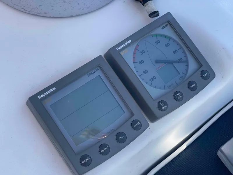 Slide: The Image of Raymarine instruments on 2004 Beneteau Oceanis 473 sailboat dashboard. - 44