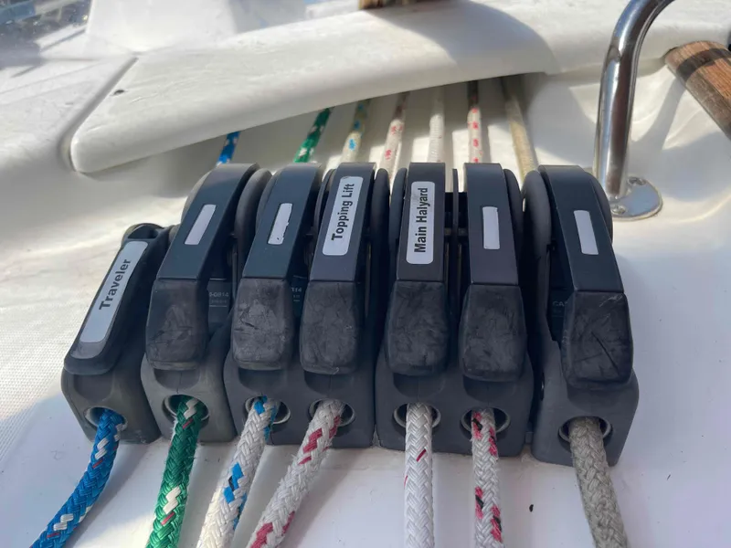 Slide: The Image of Rope clutches on a 2004 Beneteau Oceanis 473 sailboat deck. - 50