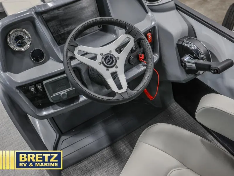 Slide: The Image of 2025 A-22 CLZ DH boat dashboard with steering wheel and controls, Bretz RV & Marine branding. - 6