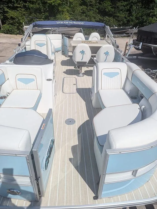 Slide: The Image of 2025 Berkshire 22E CTS pontoon boat with spacious seating and elegant design. - 6