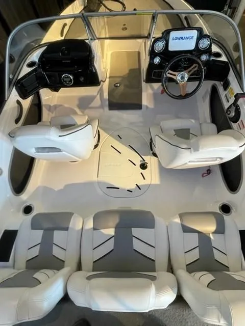 Slide: The Image of 2019 Nitro Z19 Sport boat interior with steering wheel and seating arrangement. - 5