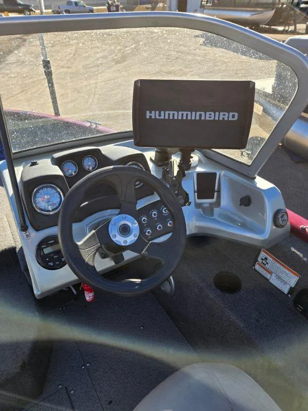 Slide: The Image of 2018 Tracker Pro Guide V-175 WT boat dashboard with Humminbird fish finder. - 14