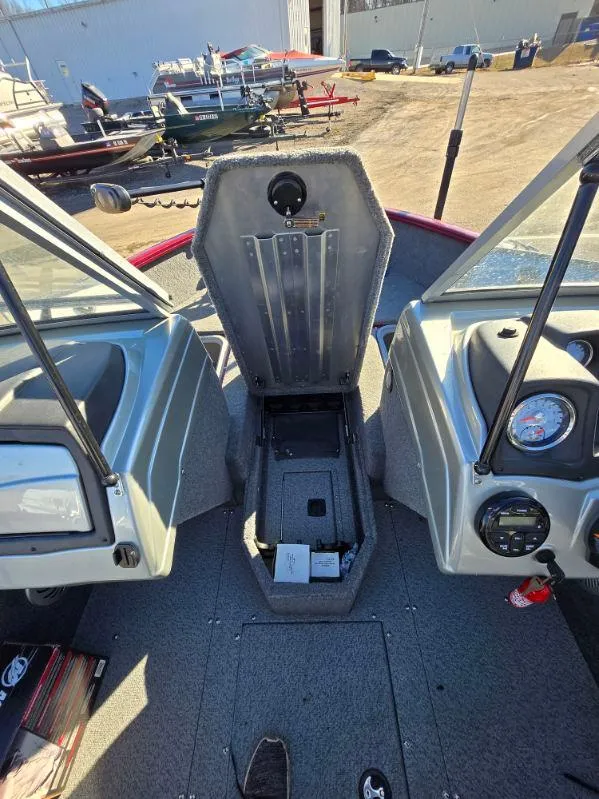 Slide: The Image of 2018 Tracker Pro Guide V-175 WT boat interior with open storage compartment. - 16