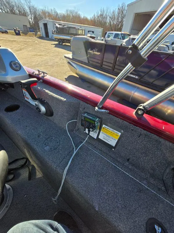 Slide: The Image of 2018 Tracker Pro Guide V-175 WT boat interior with control panel and wiring. - 18