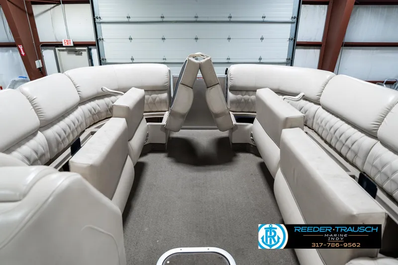 Slide: The Image of Interior of 2014 Bennington 2250 RCB pontoon boat with beige seating. - 22