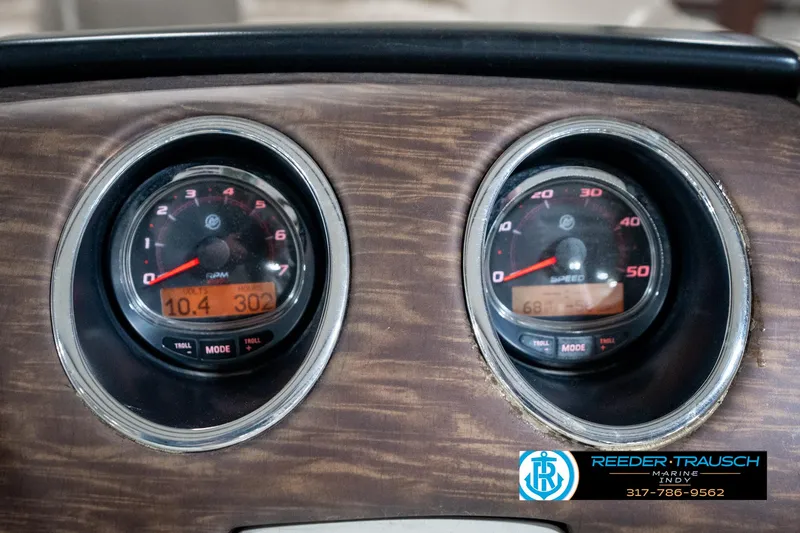 Slide: The Image of Dashboard gauges of a 2014 Bennington 2250 RCB boat, displaying speed and RPM. - 38