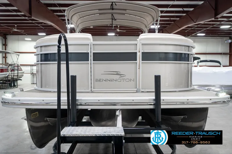 Slide: The Image of 2014 Bennington 2250 RCB pontoon boat in showroom, rear view. - 5