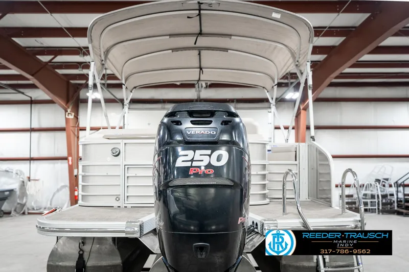 Slide: The Image of 2014 Bennington 2250 RCB pontoon boat with 250 Pro Verado engine in warehouse. - 9