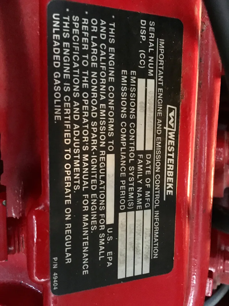Slide: The Image of Westerbeke engine label on a 2002 Sea Ray 320 Sundancer, detailing emissions and fuel specifications. - 27