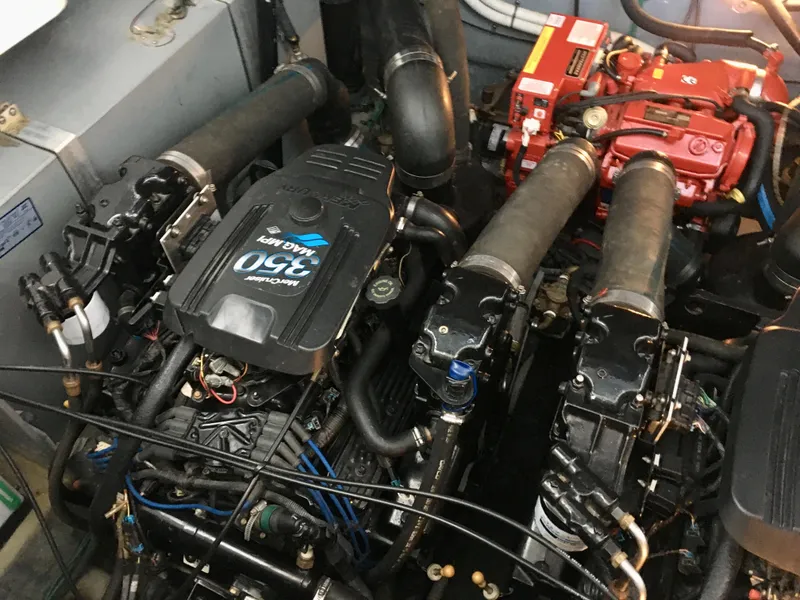 Slide: The Image of Engine compartment of 2002 Sea Ray 320 Sundancer with MerCruiser 350 MAG MPI engines. - 28