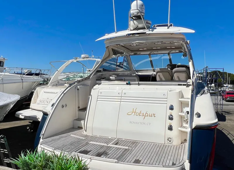 Slide: The Image of Windy Typhoon 43 yacht, 2007 model, docked under clear blue sky. - 1