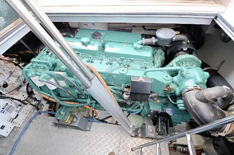 Slide: The Image of Engine compartment of 2007 Windy Typhoon 43 boat, showcasing detailed machinery. - 25