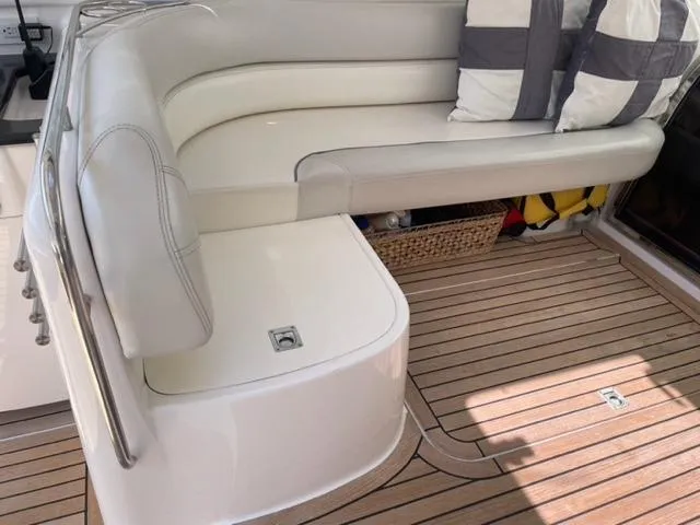 Slide: The Image of Luxurious seating area on 2007 Windy Typhoon 43 yacht with wooden deck. - 33