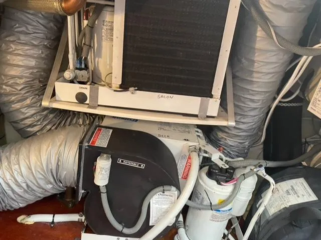 Slide: The Image of Engine room of a 2007 Windy Typhoon 43 with HVAC components and ductwork. - 37