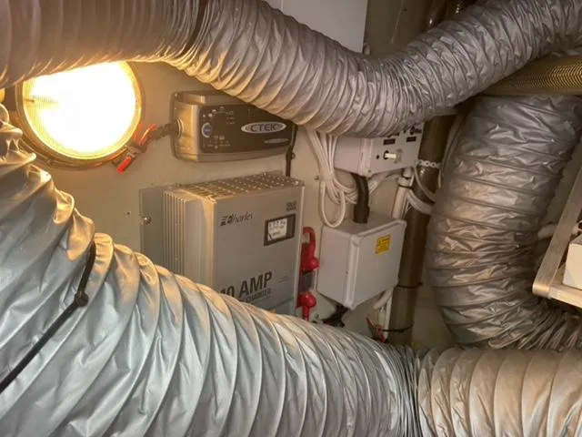 Slide: The Image of Engine room of 2007 Windy Typhoon 43 with ventilation ducts and electrical components. - 38