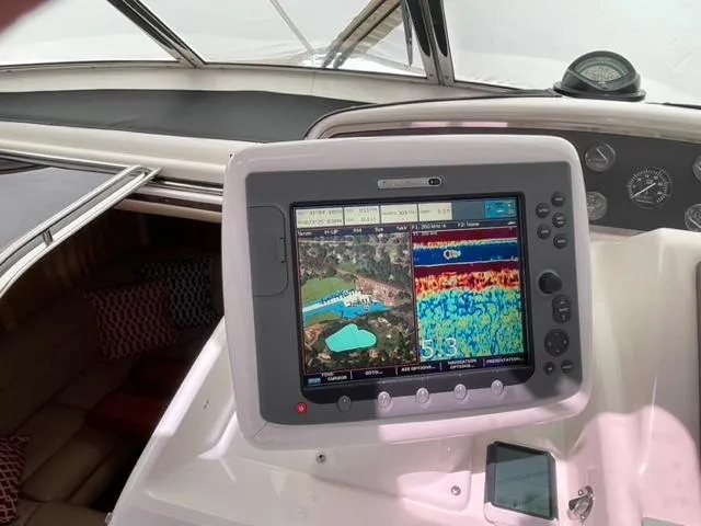 Slide: The Image of Boat navigation system on 2007 Windy Typhoon 43, displaying sonar and map data. - 40