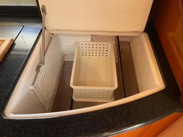 Slide: The Image of Built-in storage compartment on a 2007 Windy Typhoon 43 yacht. - 43