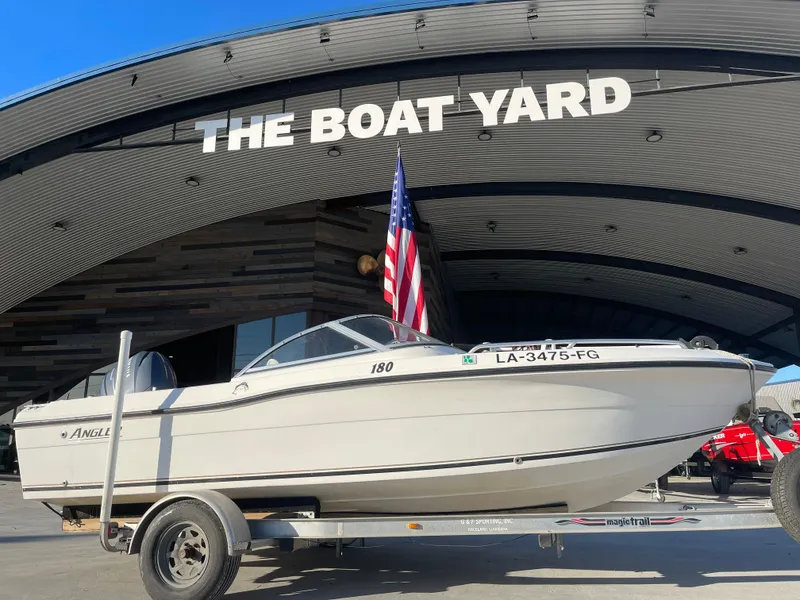 Slide: The Image of 2002 Angler 18 DC boat on trailer at The Boat Yard. - 2