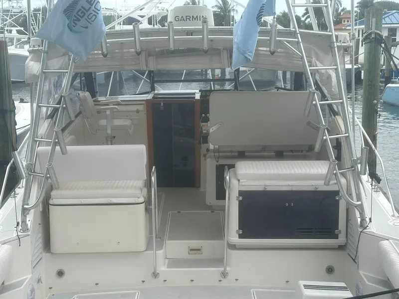 Slide: The Image of 1990 Rampage 36 Sportfisherman boat interior with seating and equipment. - 12