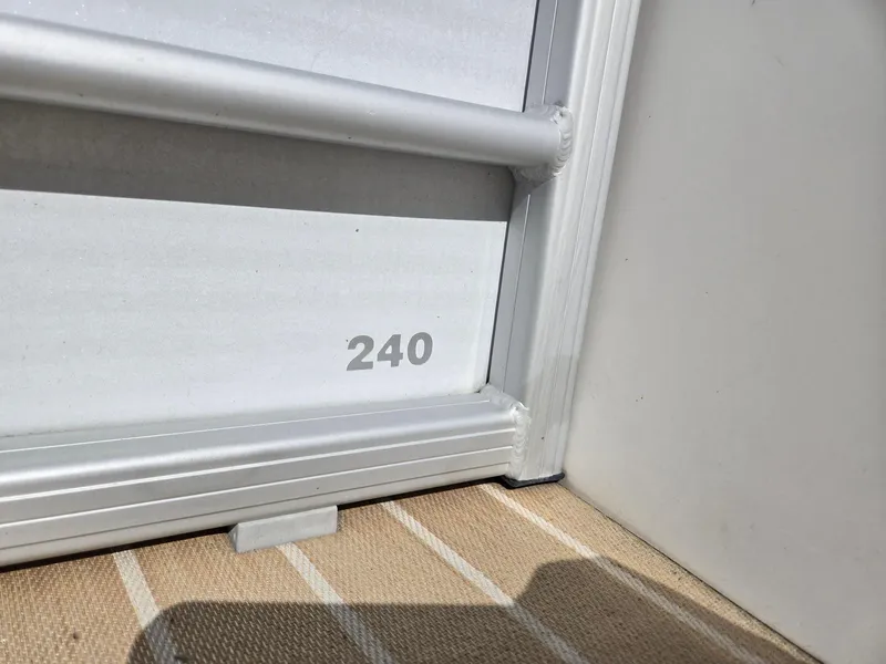 Slide: The Image of AquaPatio 240 CB 2016 model detail, featuring aluminum frame and flooring. - 28