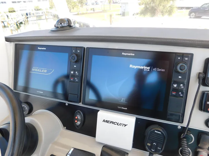 Slide: The Image of Control panel of 2017 Boston Whaler 270 Dauntless with Raymarine displays. - 24