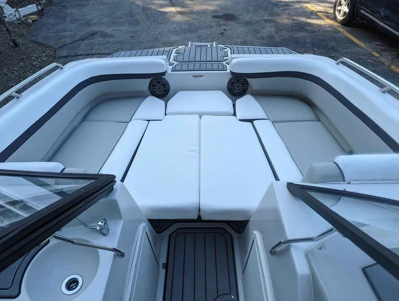 Slide: The Image of 2024 Starcraft SVX 210 IO boat interior with spacious seating and modern design. - 7