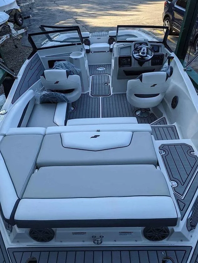 Slide: The Image of 2024 Starcraft SVX 210 IO boat interior with modern seating and sleek design. - 8