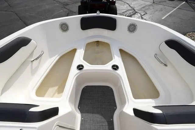 Slide: The Image of 2021 Bayliner VR5 Bowrider I/O boat interior with spacious seating and storage compartments. - 10