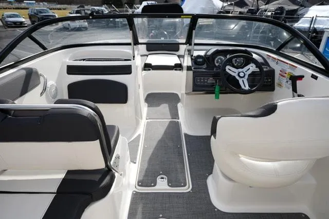 Slide: The Image of 2021 Bayliner VR5 Bowrider I/O interior with modern dashboard and seating. - 12