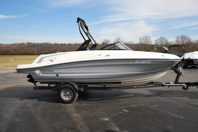 Slide: The Image of 2021 Bayliner VR5 Bowrider I/O on trailer, parked outdoors. - 4