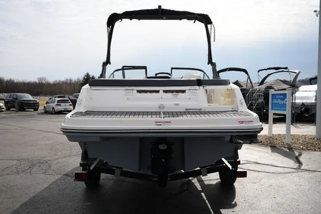 Slide: The Image of 2021 Bayliner VR5 Bowrider I/O boat, rear view, parked on a trailer. - 6