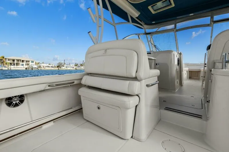 Slide: The Image of 2021 Grady-White 335 Freedom boat interior with seating and ocean view. - 18