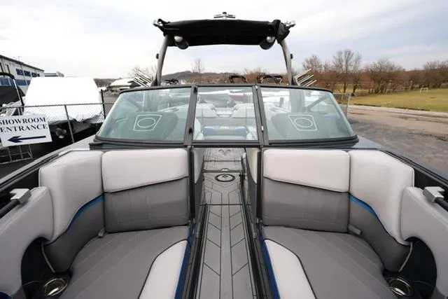 Slide: The Image of 2019 Supra SE 450 boat interior with sleek seating and modern design. - 8