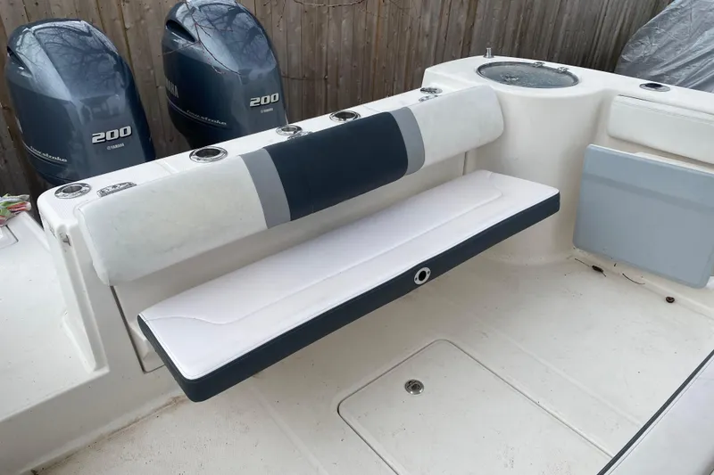 Slide: The Image of 2020 Robalo R272 Center Console boat with Yamaha 200 engines and cushioned seating. - 39