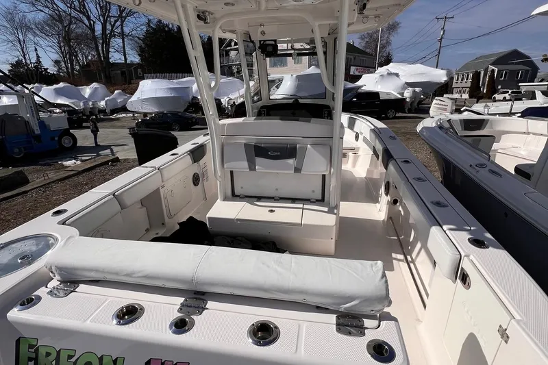 Slide: The Image of 2020 Robalo R272 Center Console boat with spacious seating and modern design. - 4