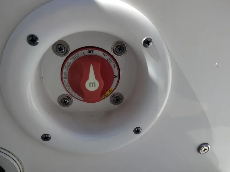 Slide: The Image of Battery switch on a 2021 NauticStar 2302 Legacy boat. - 24
