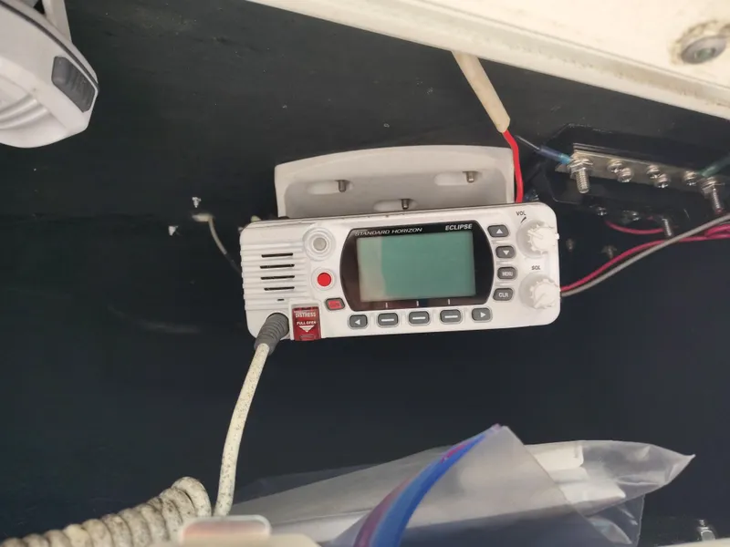 Slide: The Image of Marine radio equipment on a 2021 NauticStar 2302 Legacy boat. - 30