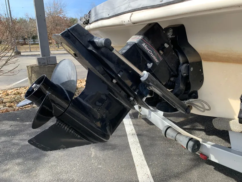Slide: The Image of 2006 Starcraft SeaStar 2000 boat with MerCruiser outboard motor in parking lot. - 7