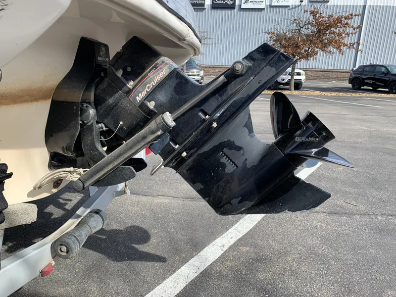 Slide: The Image of Outboard motor of 2006 Starcraft SeaStar 2000 boat in parking lot. - 8
