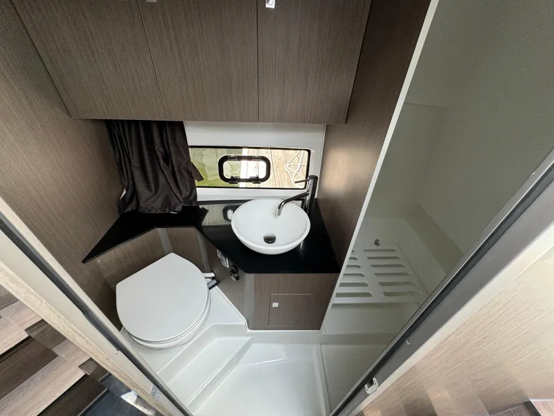 Slide: The Image of 2024 Beneteau Gran Turismo 32 bathroom with modern fixtures and compact design. - 15