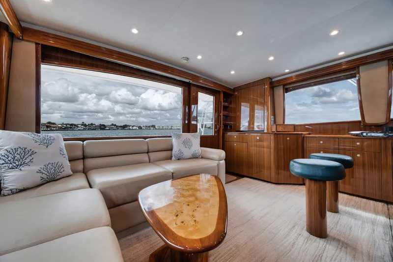 Slide: The Image of Luxurious interior of 2009 Viking 54 Convertible yacht with elegant wood finishes and plush seating. - 33